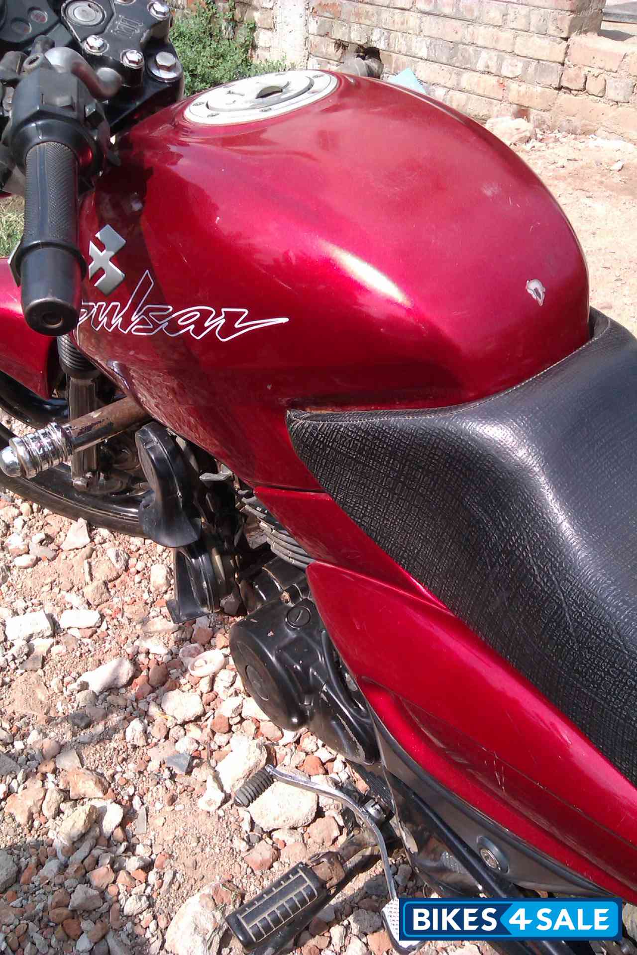 Red Bajaj Pulsar 150 Round Headlight