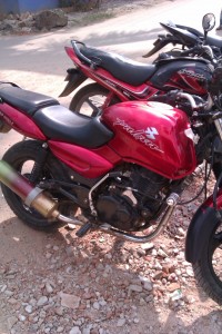 Red Bajaj Pulsar 150 Round Headlight