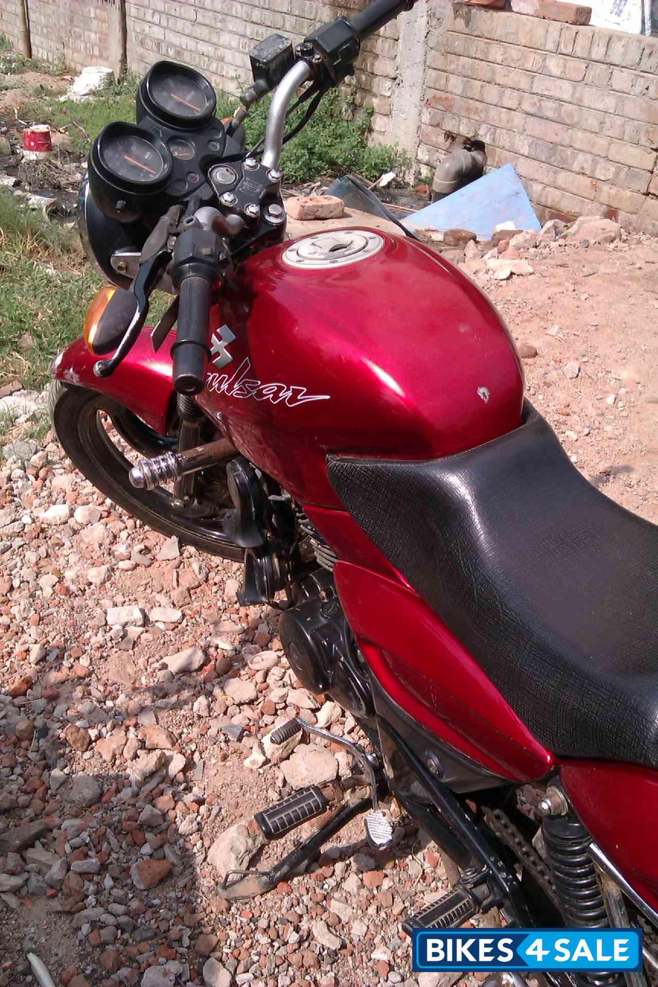 Red Bajaj Pulsar 150 Round Headlight