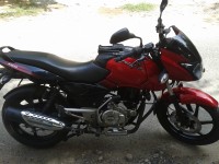 Red-black Bajaj Pulsar 150 DTSi