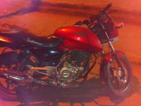 Red-black Bajaj Pulsar 150 DTSi