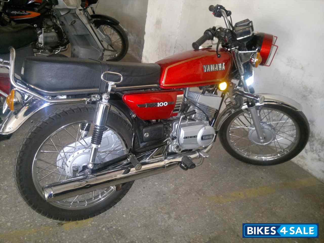 Red Yamaha RX 100