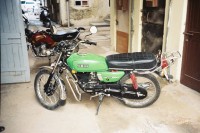 Green Yamaha RX 100