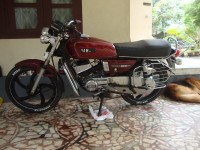 Red Yamaha RX 100