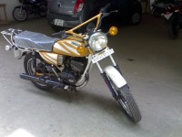 Yellow Yamaha RX 100