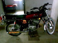 maroon Yamaha RX 100