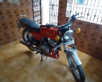 Red Yamaha RX 100