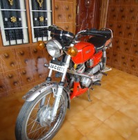 Red Yamaha RX 100