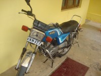 Light Blue Bajaj KB 100