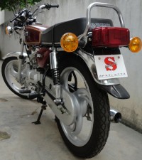 Red Yamaha RX 100