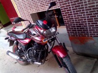 Red--black Bajaj Discover DTSi 135