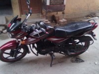 Red--black Bajaj Discover DTSi 135