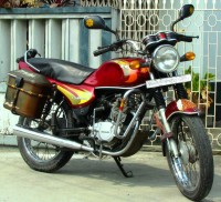 Red Bajaj Caliber