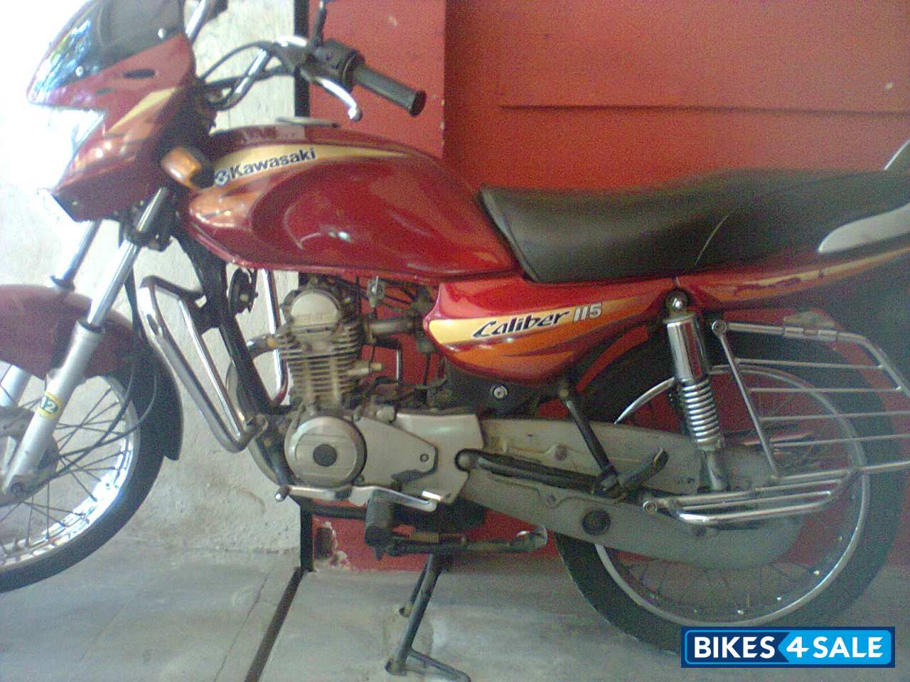 Red Bajaj Caliber 115