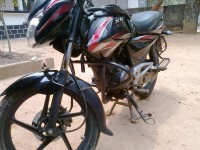 Black Bajaj XCD 135 DTS-Si