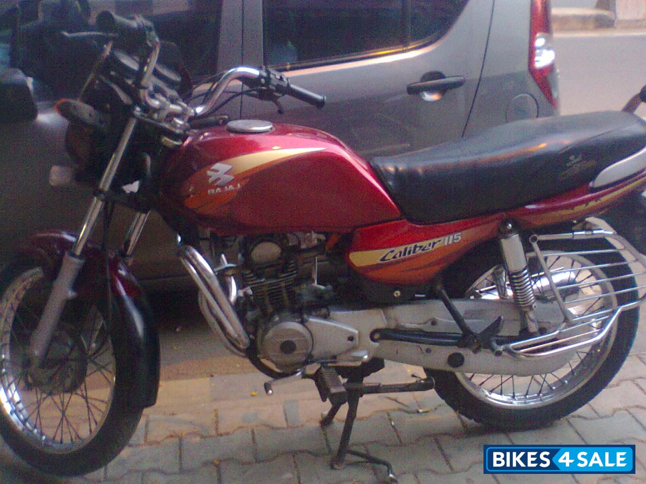 Red Bajaj Caliber 115