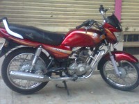 Red Bajaj Caliber 115